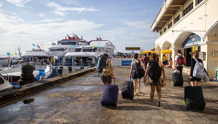 Phuket, Thailand - December 8 2017: Rassada Harbor, pier gate 3 less crowded for boarding to Phi Phi island. Phuket popular tourist location of Thailand for honeymoon and vacation